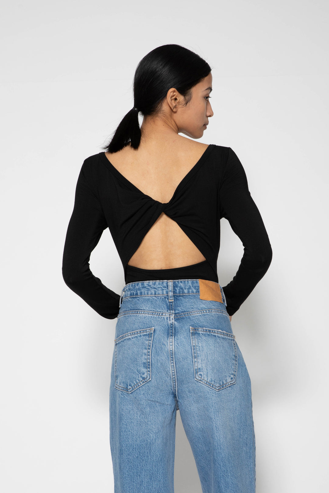 Collagen Twisted Back Bodysuit