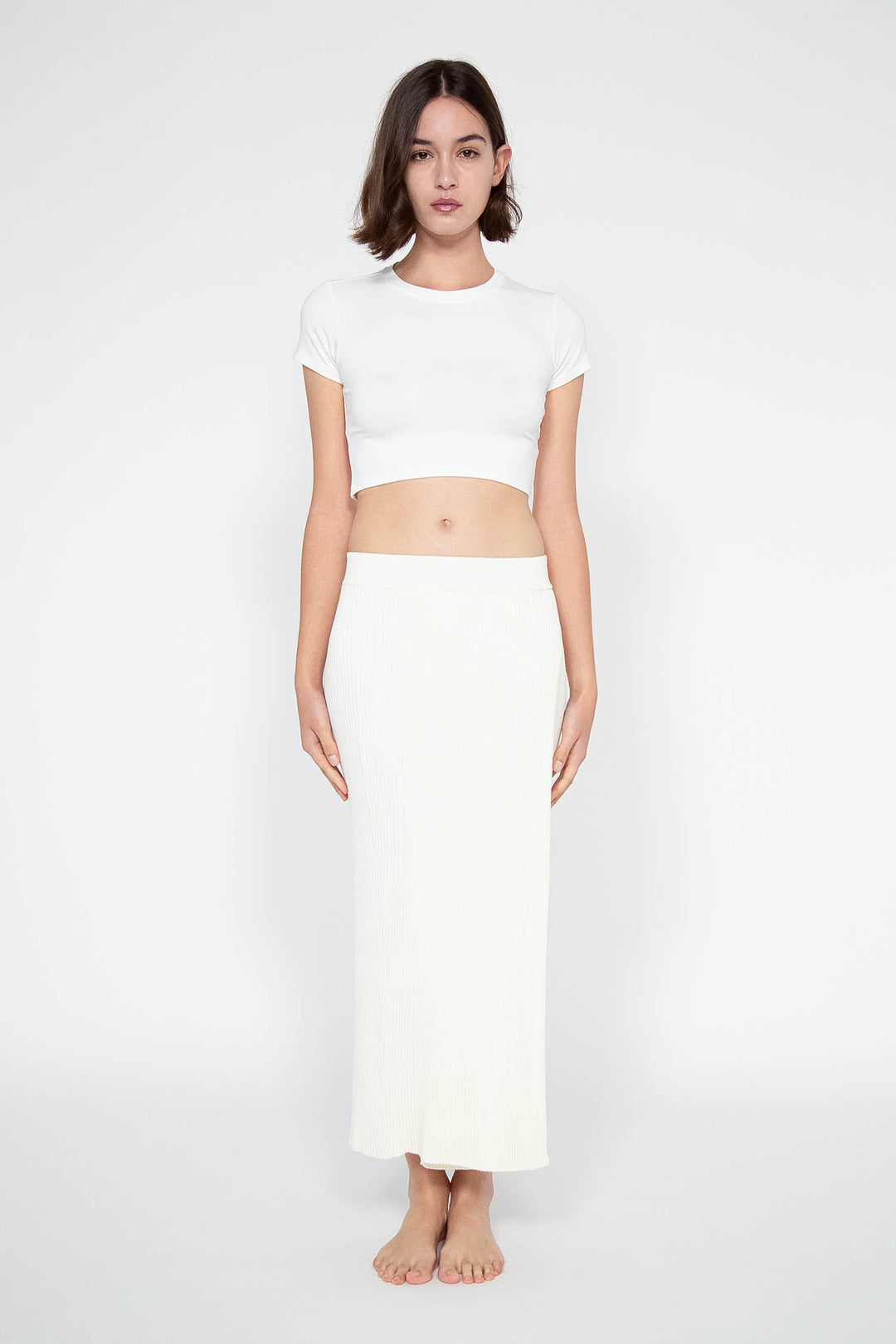 Woman modeling front Bamboo Knit Slit Skirt